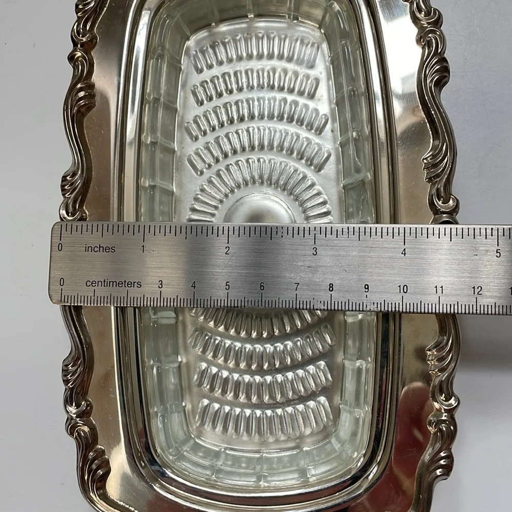 William A Rogers set of silver-plated gravy boat, butter‎ dish, & platter.